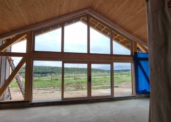 Chantier de construction neuve Fenêtre INTERNORM en bois alu et PVC alu à Semondans