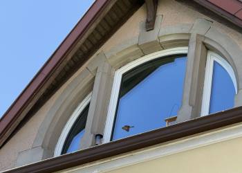 Rénovation d'une fenêtre cintrée INTERNORM KF310 avec vitrage de protection solaire à Thann
